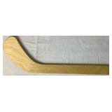 University of Minesota Mini Hockey Sticks Autographed by Head Coach Dan Lucia, 2002/2003 Back to Back Championship Poster Autographed by Thomas Vanek and Gopher Hockey Puck