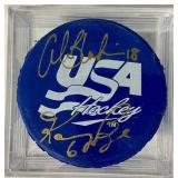 USA Hockey Blue Pucks Autographed by Alana Blahok #18 and Karen Bye #6