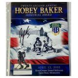 Jordan Leopold Autographed Hockey Puck and Autographed Hobey Baker Award Program April 12, 2002