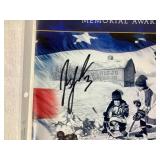 Jordan Leopold Autographed Hockey Puck and Autographed Hobey Baker Award Program April 12, 2002