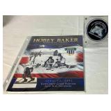 Jordan Leopold Autographed Hockey Puck and Autographed Hobey Baker Award Program April 12, 2002  - LOT 2