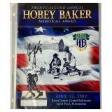 Jordan Leopold Autographed Hockey Puck and Autographed Hobey Baker Award Program April 12, 2002  - LOT 2