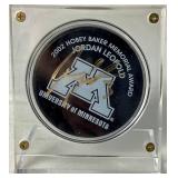 Jordan Leopold Autographed Hockey Puck and Autographed Hobey Baker Award Program April 12, 2002  - LOT 2