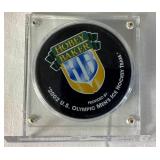 Jordan Leopold Autographed Hockey Puck and Autographed Hobey Baker Award Program April 12, 2002  - LOT 2