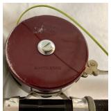 Vintage Collection of Fishing Poles with Reels