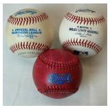 Saint Paul Saints Bundle - Commerative Bat and Baseballs, 1997 Seat Cushion, 2 Seat Cushions, Saints 2000 Snow Globe and Two 1998 Game Balls