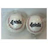 Saint Paul Saints Bundle - Commerative Bat and Baseballs, 1997 Seat Cushion, 2 Seat Cushions, Saints 2000 Snow Globe and Two 1998 Game Balls