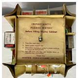 Antique Fishing Display Racks with Vintage tins and 25 Promotion Lures Plus Vintage Grain Belt Beer Chalkware Fish Plaque