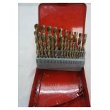 Drill bit set in red metal case