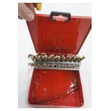 Drill bit set in red metal case