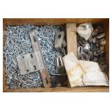 Wooden drawer full of hardware