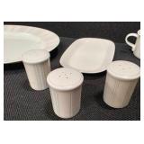 Pieces of the Mikasa Cobblestone dinnerware collection The collection includes a large oval serving platter, a smaller rectangular platter, two gravy boats (one larger, one smaller), three shakers (li