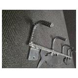 Metal Hanging Rack with Fish on it