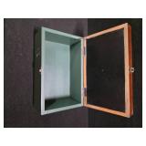 Wood Box With Shadow Box Lid filled with Fishing gear in it.