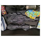 Tote full of 13 umbrellas