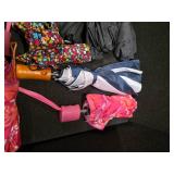 Tote full of 13 umbrellas