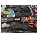 Tote full of 13 umbrellas