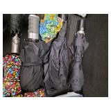 Tote full of 13 umbrellas