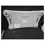 Nintendo Wii console with a Wii Balance Board and various accessories