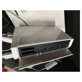 Nintendo Wii console with a Wii Balance Board and various accessories