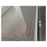 Nintendo Wii console with a Wii Balance Board and various accessories