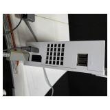 Nintendo Wii console with a Wii Balance Board and various accessories