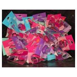 Assortment of 99 mini desktop staplers, in 4 different colors