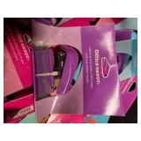 Assortment of 99 mini desktop staplers, in 4 different colors