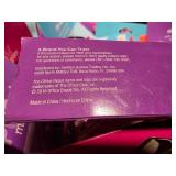 Assortment of 99 mini desktop staplers, in 4 different colors