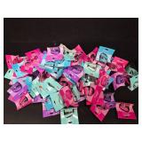 Assortment of 99 mini desktop staplers, in 4 different colors