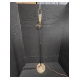 mid-century modern design LAMP with a brass swing arm and a dark stem