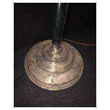 mid-century modern design LAMP with a brass swing arm and a dark stem