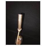 mid-century modern design LAMP with a brass swing arm and a dark stem