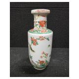 Chinese Porcelain Vase depicting flowers, vines and a little green bird