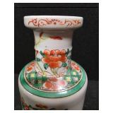 Chinese Porcelain Vase depicting flowers, vines and a little green bird