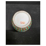 Chinese Porcelain Vase depicting flowers, vines and a little green bird