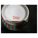 Chinese Porcelain Vase depicting flowers, vines and a little green bird