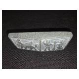 Cambodian stone artifact depicting carvings of an ancient race.