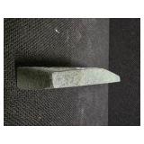 Cambodian stone artifact depicting carvings of an ancient race.