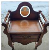 Antique Wooden Vanity with an Oval Mirror