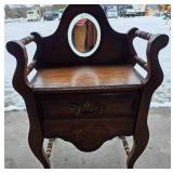 Antique Wooden Vanity with an Oval Mirror