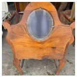 Antique Wooden Vanity with an Oval Mirror