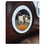 Antique Wooden Vanity with an Oval Mirror