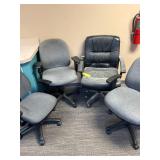 Four Office Chairs With Adjustable Features