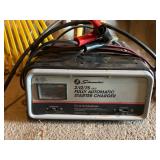 Tools Including Schumacher Starter Charger, Shovels, Rake, and Hand Tools