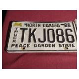 Vintage ND License Plate & (2) Metal Bathroom Signs