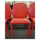 A set of 4 Red "Dumbo" Chairs by Miniforms.