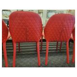 A set of 4 Red "Dumbo" Chairs by Miniforms.