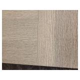 A Stylish Wood Grain Cocktail Table.