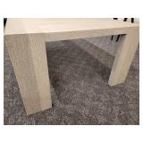 A Stylish Wood Grain Cocktail Table.